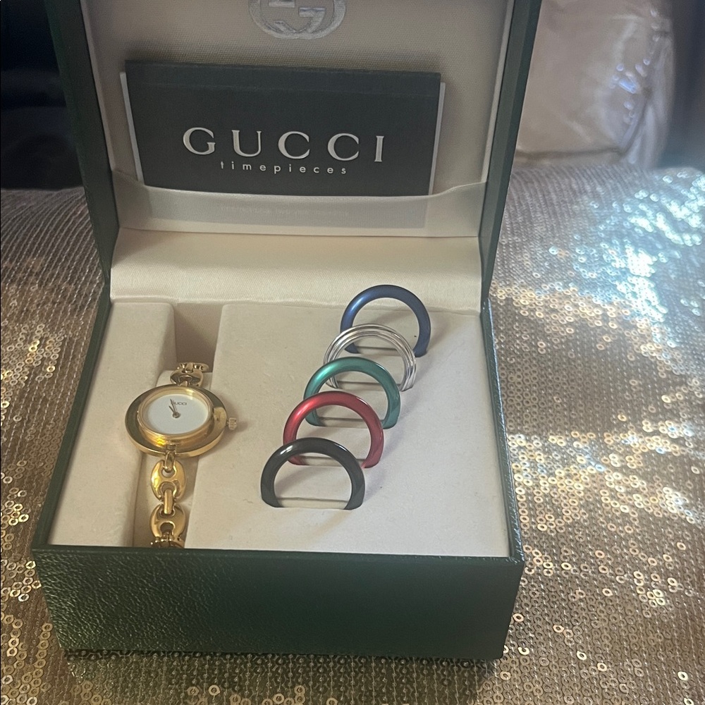 Gucci Gold Timepiece with Colorful Bezels